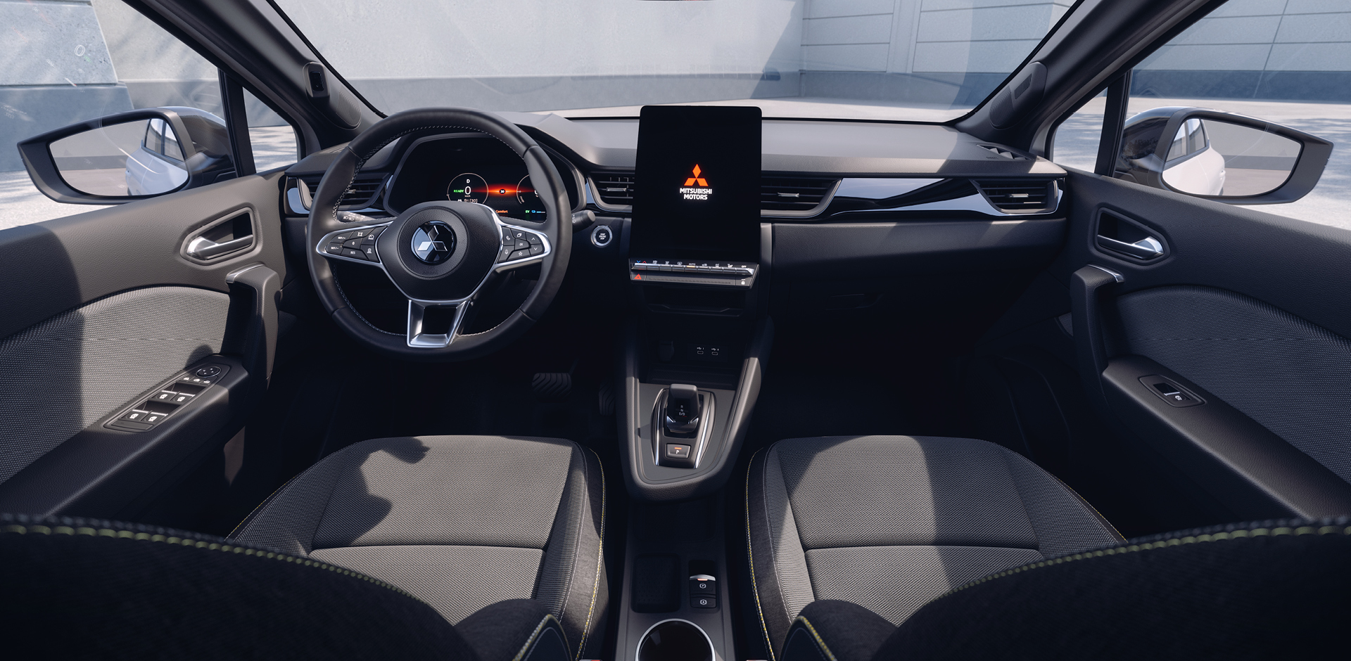 Innenansicht des Grandis Select: Blick von hinten auf das Cockpit mit Multifunktionslenkrad, großem zentralen Touchscreen mit Mitsubishi Motors Logo, moderner Mittelkonsole und zwei großzügigen Vordersitzen – betont den attraktiven, praktischen und geräumigen Innenraum des Fahrzeugs.